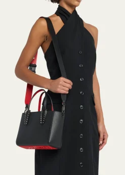 THIS ITEM IS NOT AVAILABLE.Christian LouboutinCabata Mini Tote Bag in Leather with Spikes